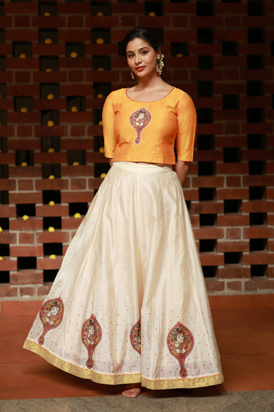 Valkannadi Printed Skirtset with Krishna Peedam Printed Top Mustard Off White