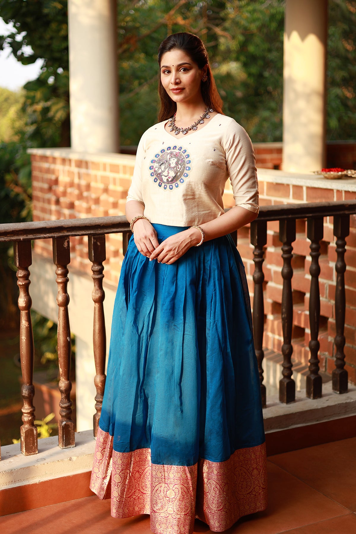 Krishna Mural Embroidered Top with Zari Border Skirtset Off White Blue