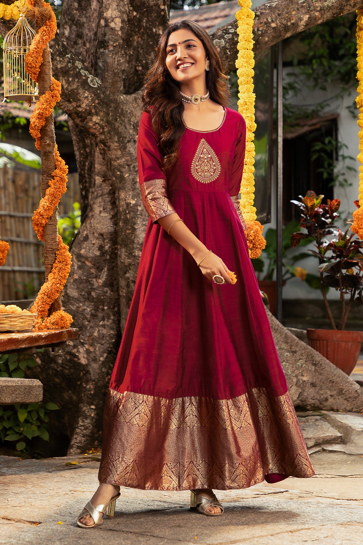 Thilagam Motif Embroidered With Gold Zari Border Anarkali Maroon