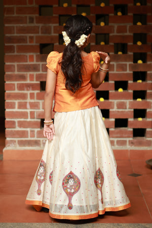 Valkannadi Printed Kids Skirtset with Embroidered Top with Tie up Orange Off White