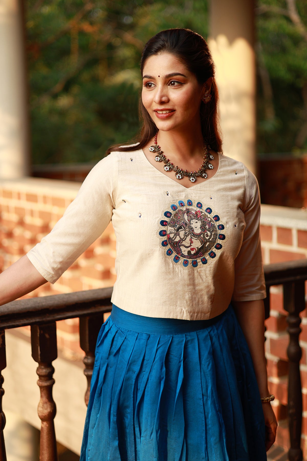 Krishna Mural Embroidered Top with Zari Border Skirtset Off White Blue
