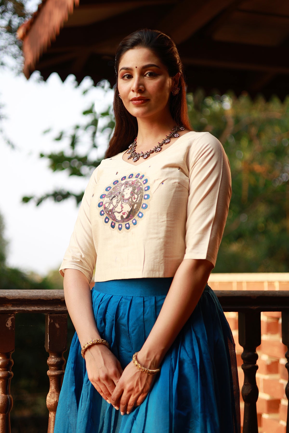 Krishna Mural Embroidered Top with Zari Border Skirtset Off White Blue
